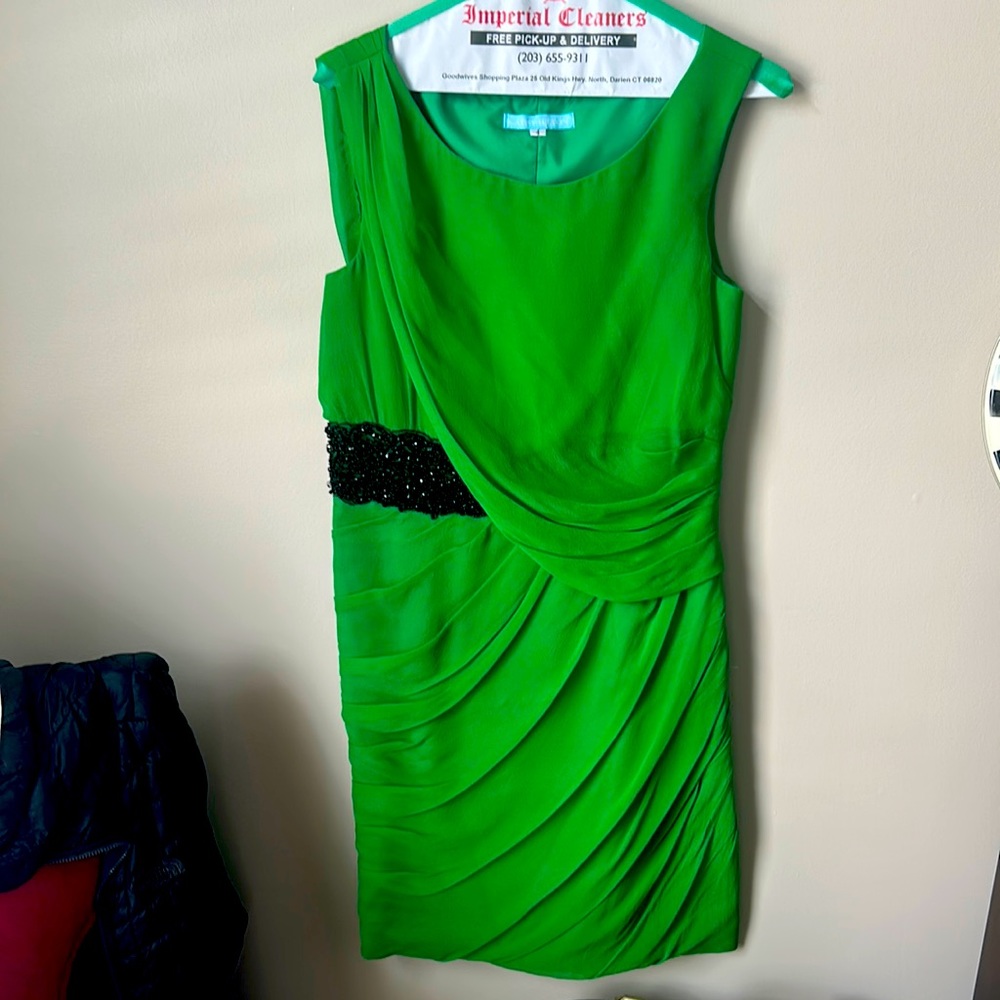 Kathy Hilton beautiful emerald green dress with a beaded belt accent